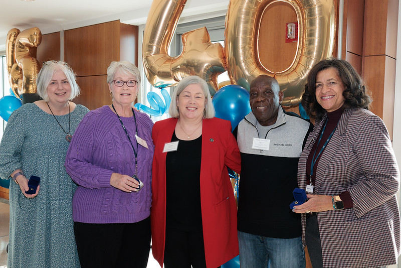 2023 Career Milestones recipients with President Granberg