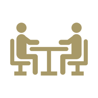 Engage Image of two people sitting at a table