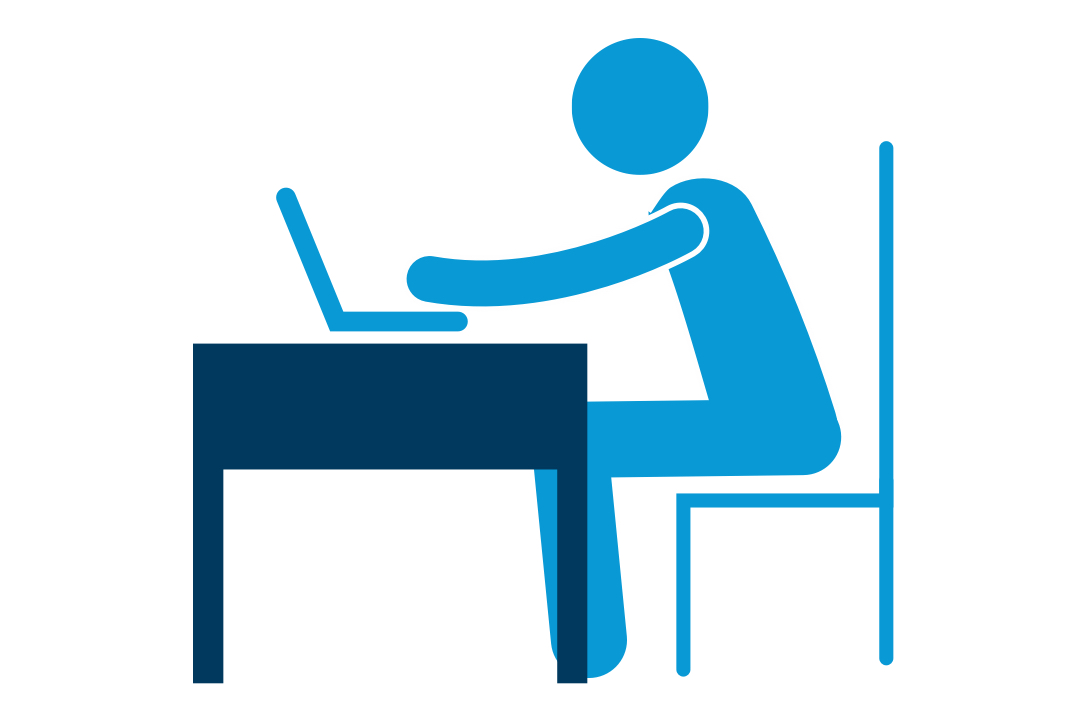 Person typing at desk