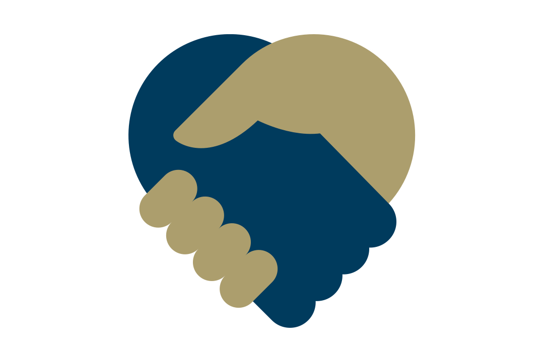 Two people holding hands