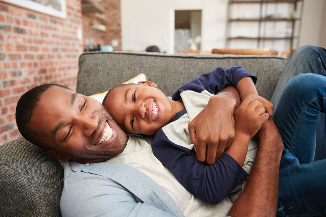 A father and child hugging