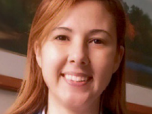 Headshot of Arzu Erkus