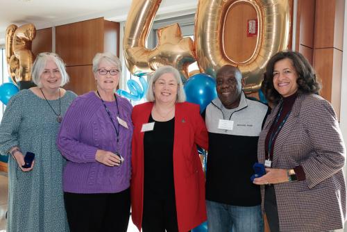 2023 Career Milestones recipients with President Granberg